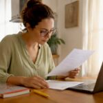 Translator reviewing academic documents at desk