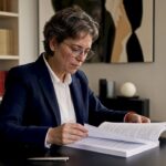 Translator reviewing legal contract at desk