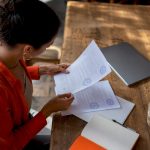 Professional woman reviewing certified translation documents