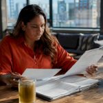 Woman reviewing certified translation documents