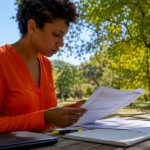 Linguist reviewing technical manual and glossary