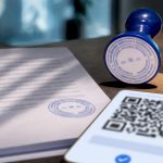 NAATI stamp and QR code on translation page